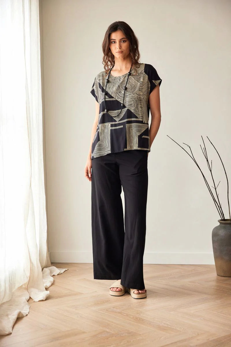 Peruzzi Top mit schwarzem und goldenem geometrischem Muster