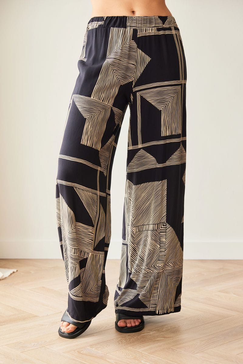 Peruzzi Schwarze und goldene geometrische Weitbeinhose