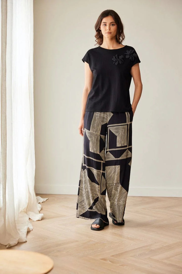 Peruzzi Schwarze und goldene geometrische Weitbeinhose