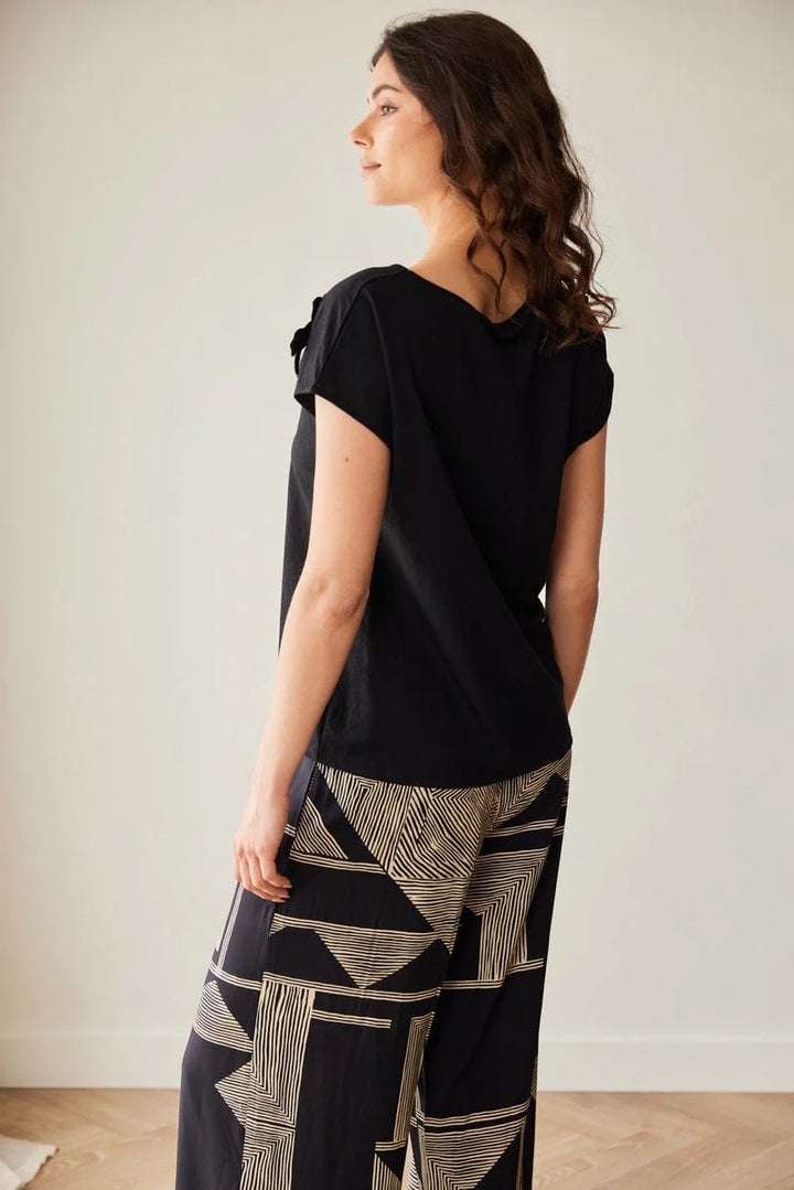 Peruzzi Schwarze und goldene geometrische Weitbeinhose